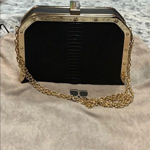 black and gold handbag